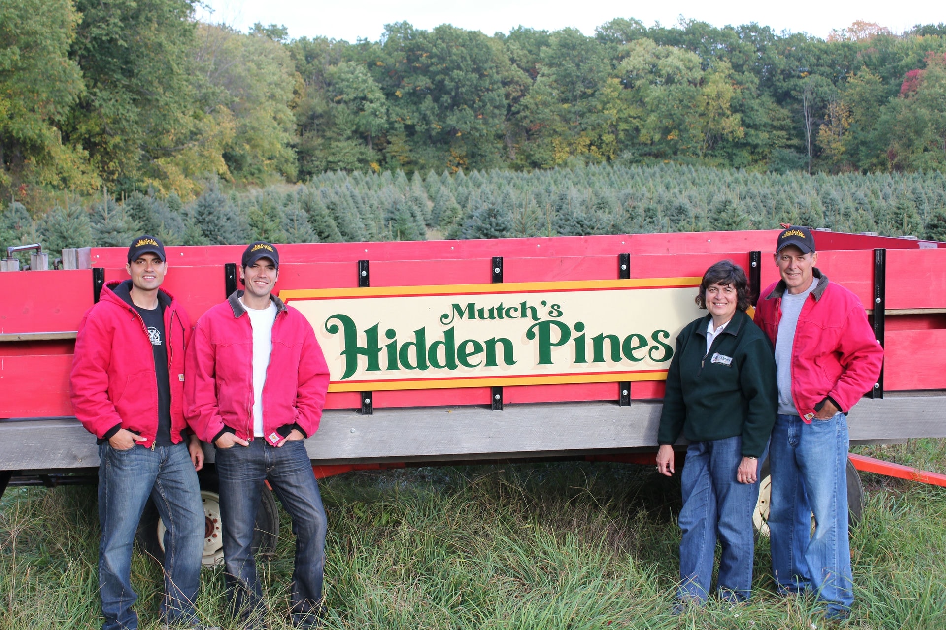 Family trees: When not at his practice, Dr. Peter Mutch (at far right), spends his time running Mutch's Hidden Pines tree far with his wife Nancy (third from left) and their sons, (at left) Andy Mutch and Dr. Nate Mutch. 
