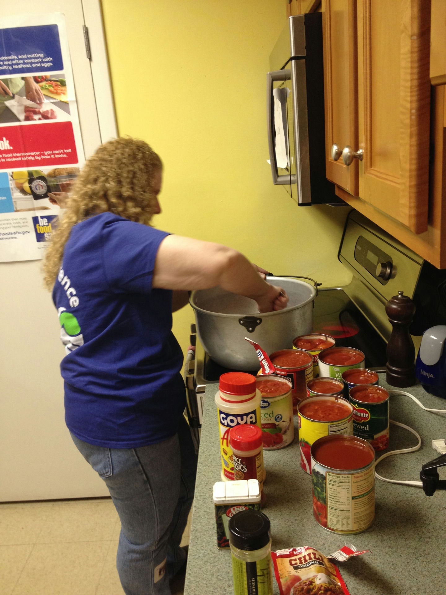 Benco Dental Associate Kim Egroff whips a batch of chili for dinner's main course for residents at Ruth's Place.