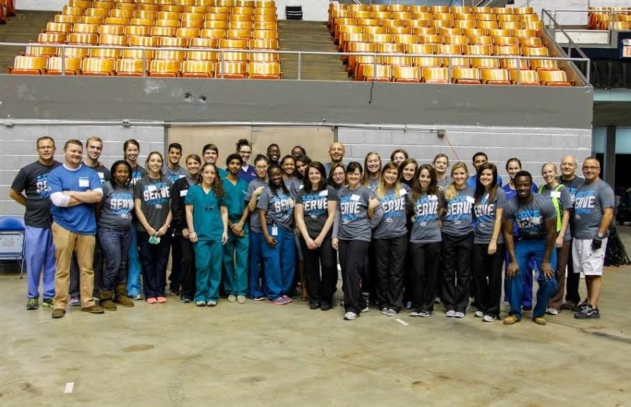 Volunteers extracting teeth at the St. Thomas Day of Hope, Health, and Healing at the Municipal Auditorium. 