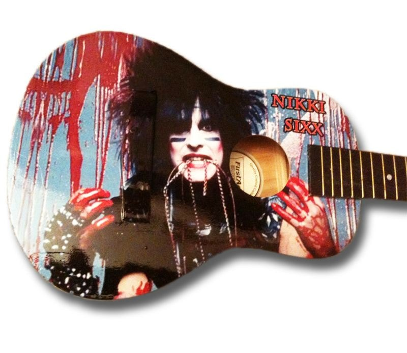  Monster Image uses its Roland wide-format printer to create a variety of wraps, and here turned a “ho-hum” guitar into a real showpiece.