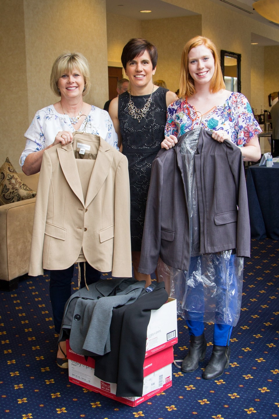 Carla Rawheiser, R.D.H. (left) and her daughter Becca, 21, (right) a student at the University of Delaware presented clothing donations for Dress For Success to Julie Radzyminski, Benco Dental’s director of business innovation and the coordinator of the Lucy Hobbs Project.