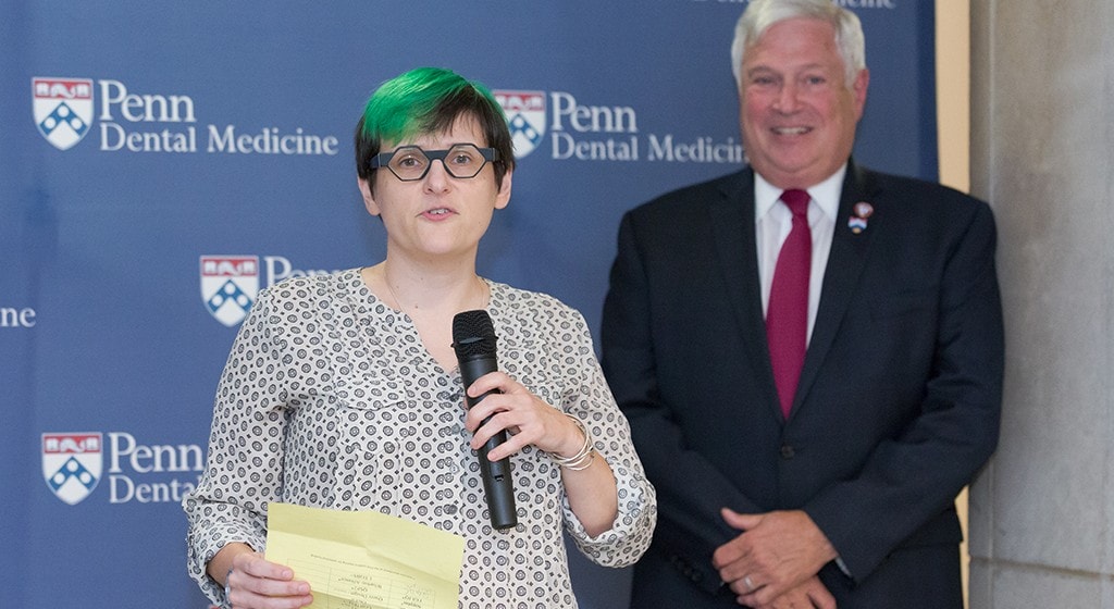 Penn Dental Medicine celebrates Pride: Erin Cross, Director of Penn’s LGBT Center, shown, with Dean Mark Wolff at the School's inaugural Pride Celebration in 2019. 
